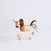 Side profile of Anamalz Wooden Horse – sensory toy with bendable rope legs for toddlers