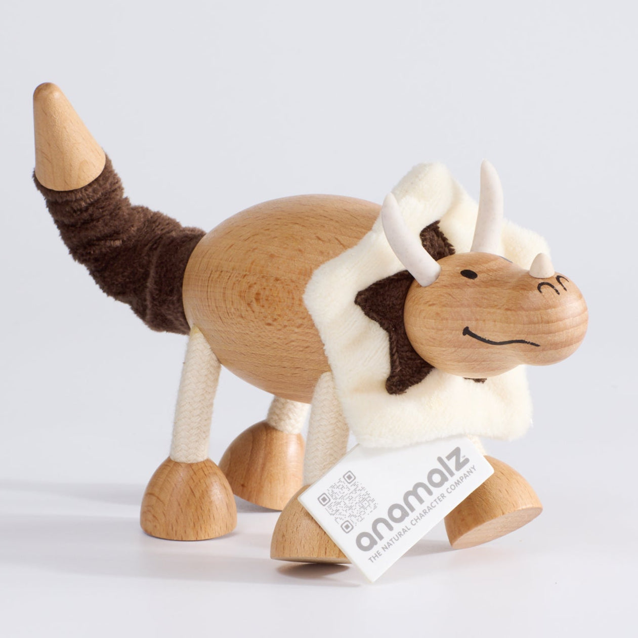 Wooden Dinosaur Toys for Toddlers with white and brown fabric design 