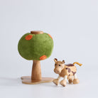 Anamalz Orange Tree toy with a green plush canopy, orange spots, and a wooden trunk and base and a wooden toy cow in front of it