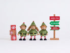 Complete Cheeky Elves set with three elves, three present blocks and corrected direction sign on a grey background