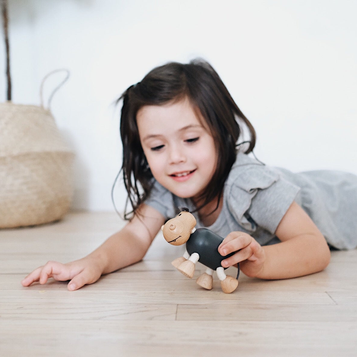 Adorable eco-friendly wooden hippopotamus toy with a playful demeanor, perfect for imaginative play and fun.